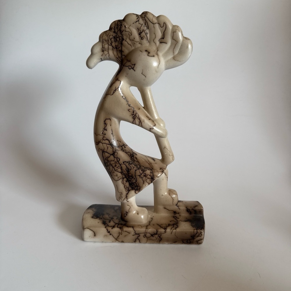 Burnished horse hair kokepeli ceramic figurine with turquoise eye carved pattern